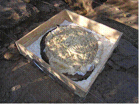 Fig. 5 – A caixa de areia após consolidação exterior com paraloide e colocação da moldura em madeira com o espaço entre ambas preenchido com poliuretano expandido.